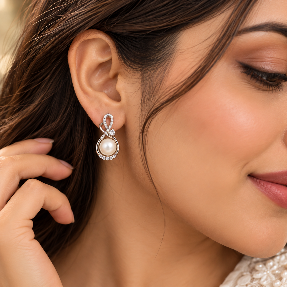 Pearl Stud Earrings | Silver Tone Infinity Twist with CZ Pavé and Pearl