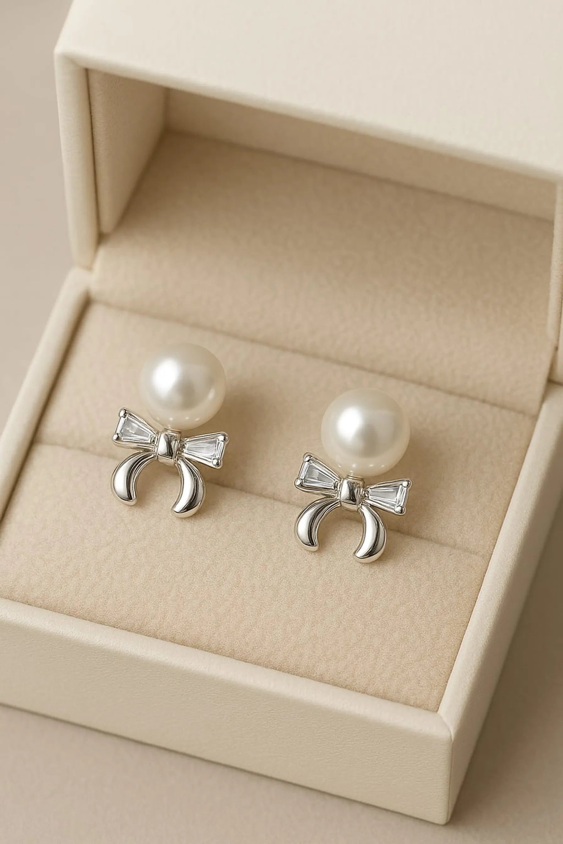 Classic Pearl Earrings with Crystal Bow Detail